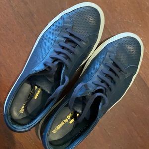Navy perforated common project sneakers
